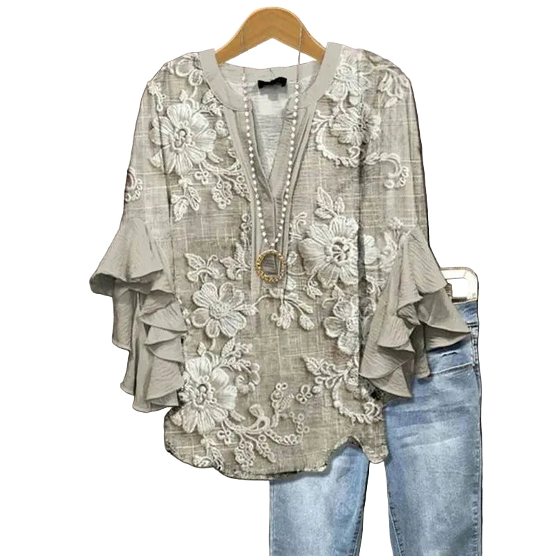 Dames T-shirt met bloemenprint en ruches aan de zoom. 0