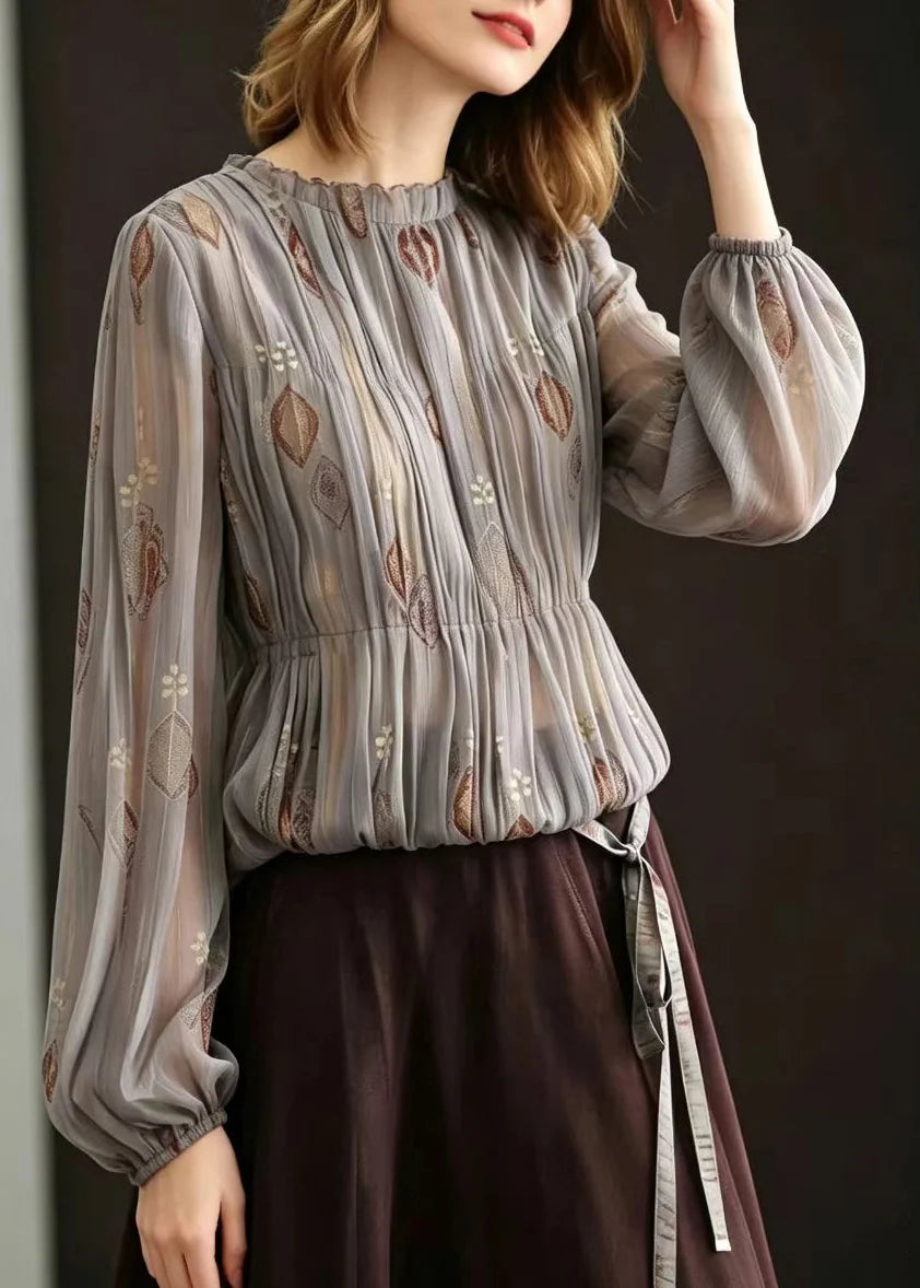 Damesblouse met ronde hals en jacquard plooien 1