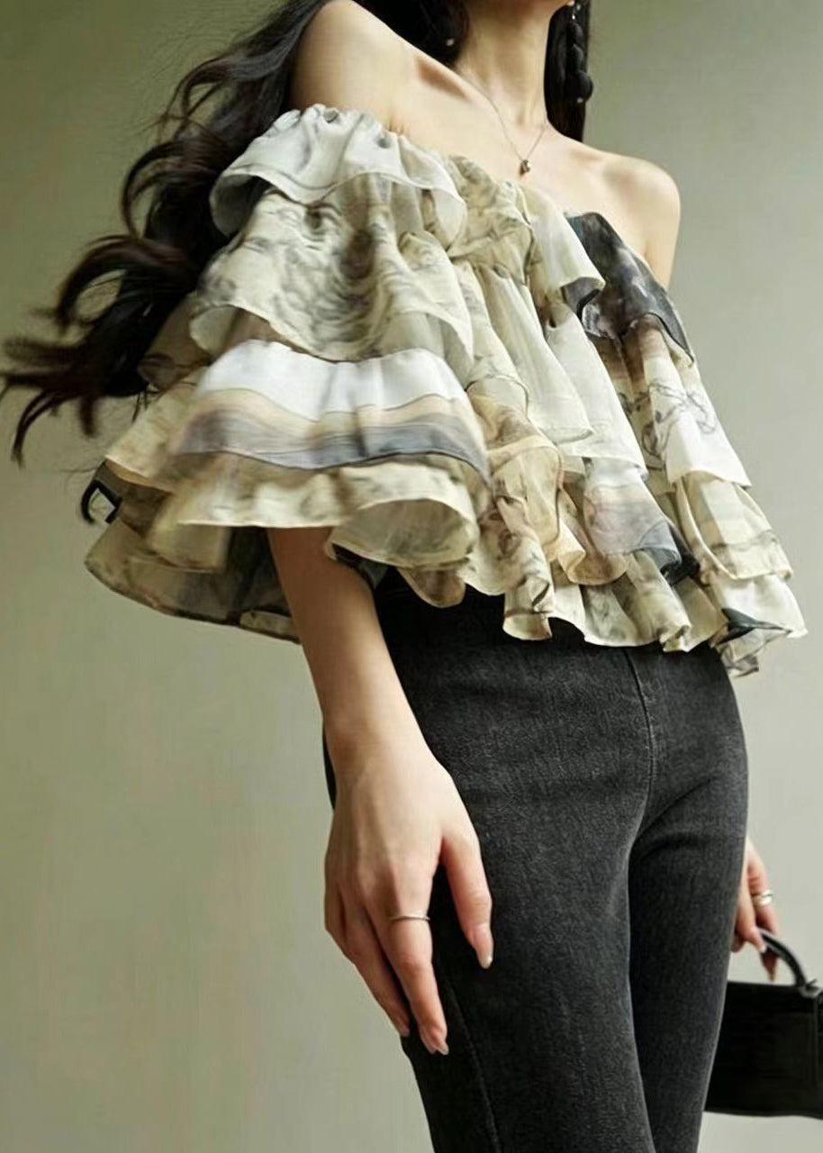 Damesblouse met schuine hals en gelaagde print 1
