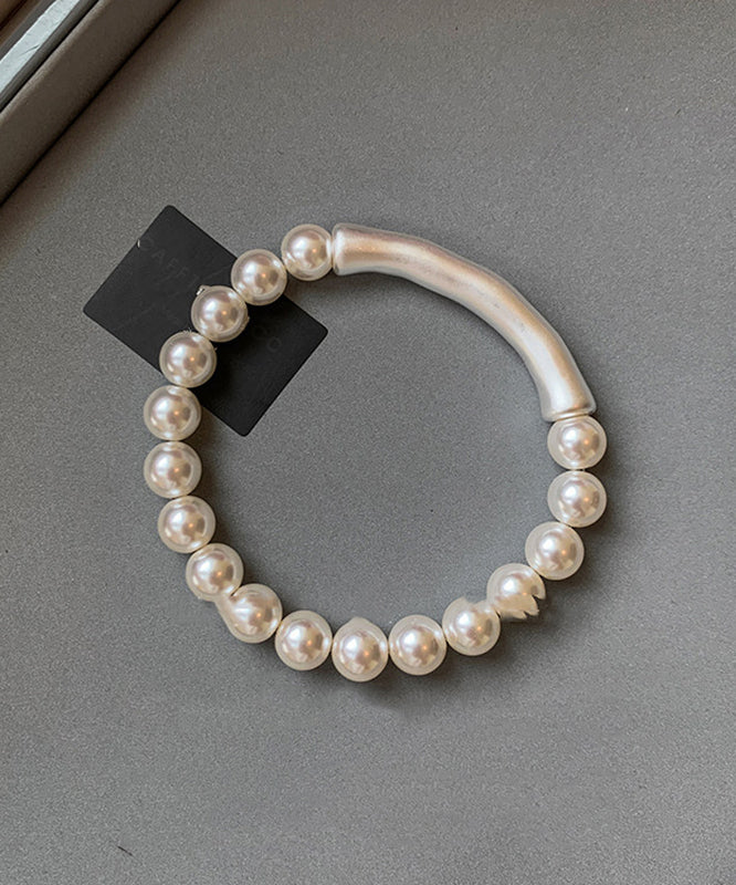 Dames Armband Met Parelaccenten en Bamboe Design 1