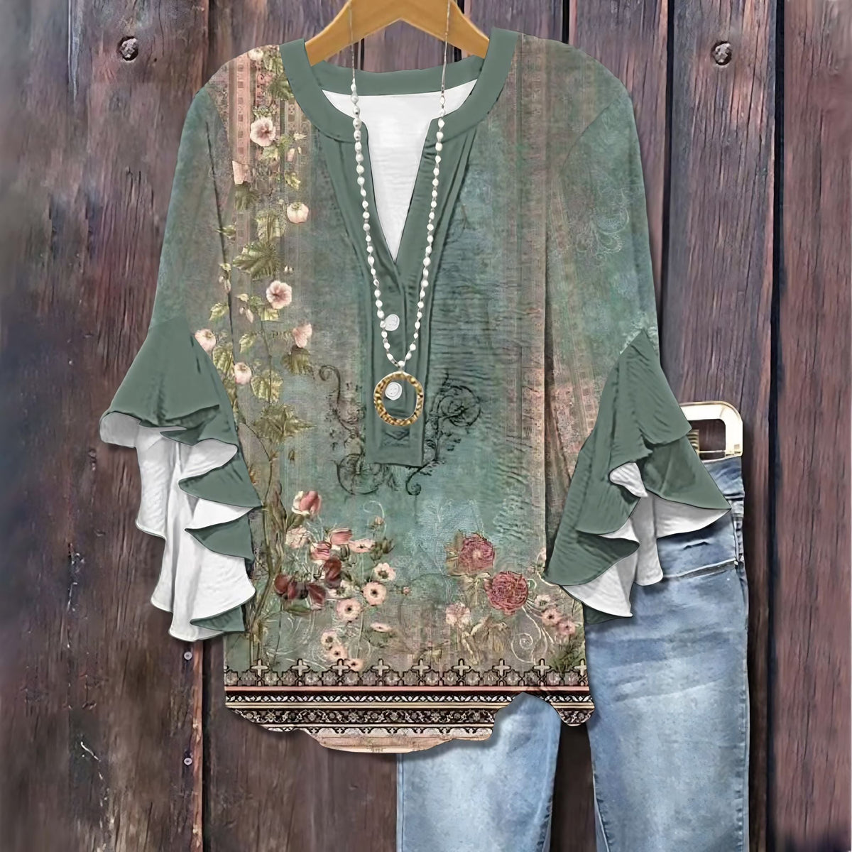 Dames T-shirt met bloemenprint en ruches aan de zoom. 1