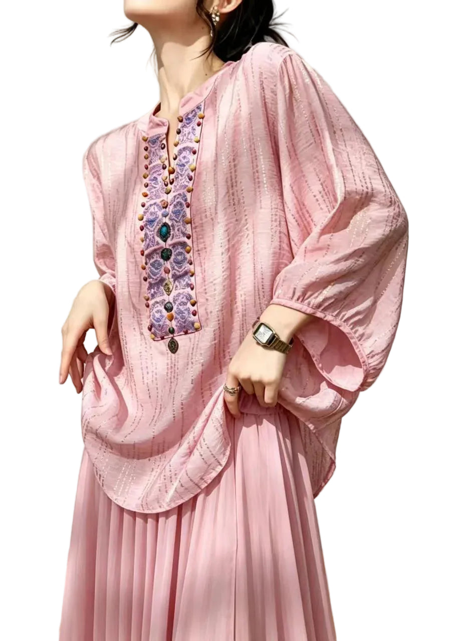 Damesblouse met lantaarnmouwen en decoratieve kralen 0