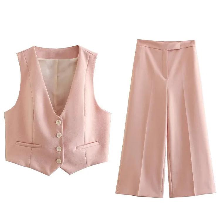 Trendy damestop & strakke broek met rechte pijpen