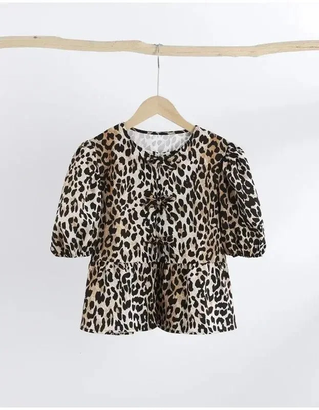 Luipaardprint blouse met pofmouwen