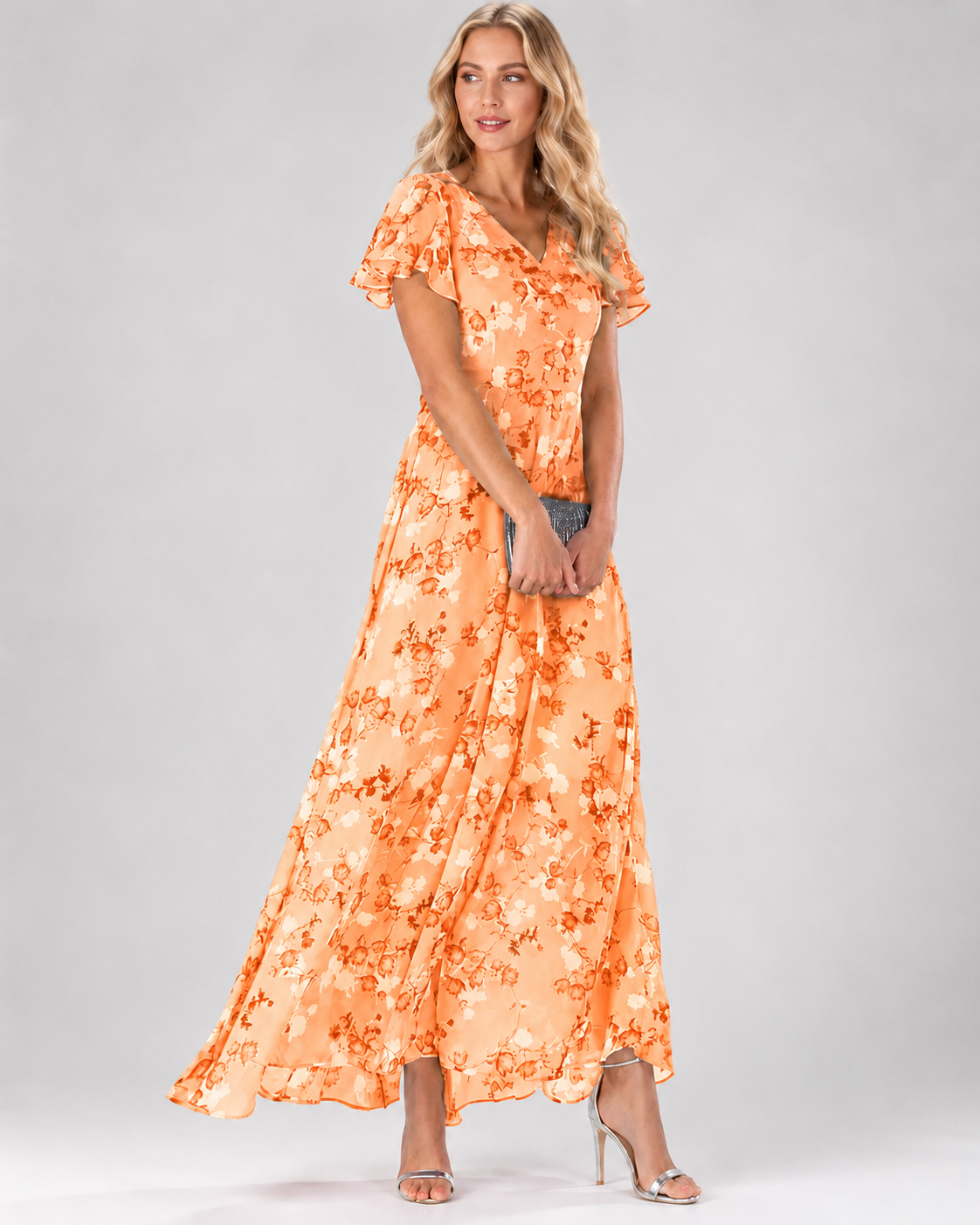 Maxi-jurk voor dames met bloemenprint, V-hals en korte, flatterende mouwen.