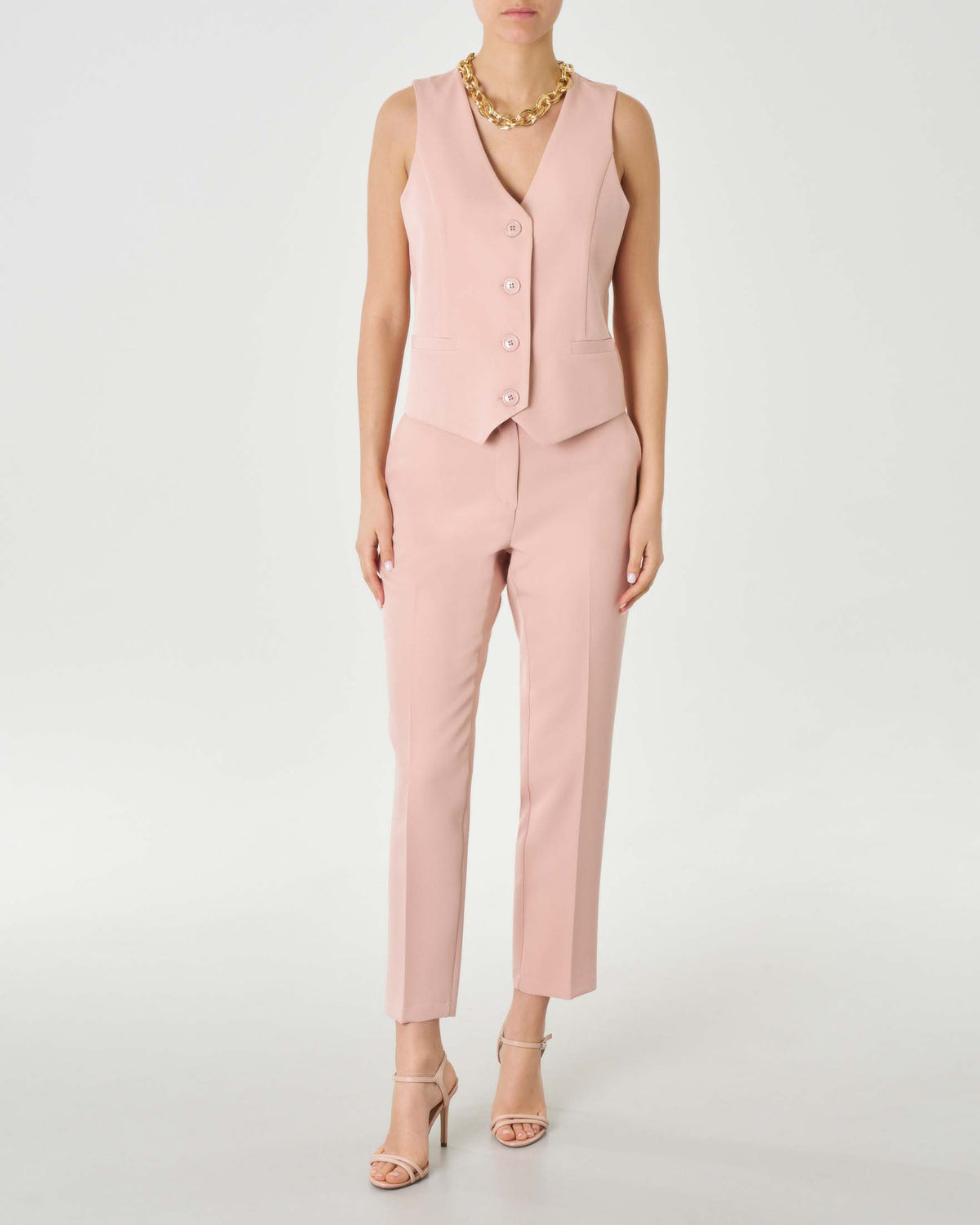 Trendy damestop & strakke broek met rechte pijpen