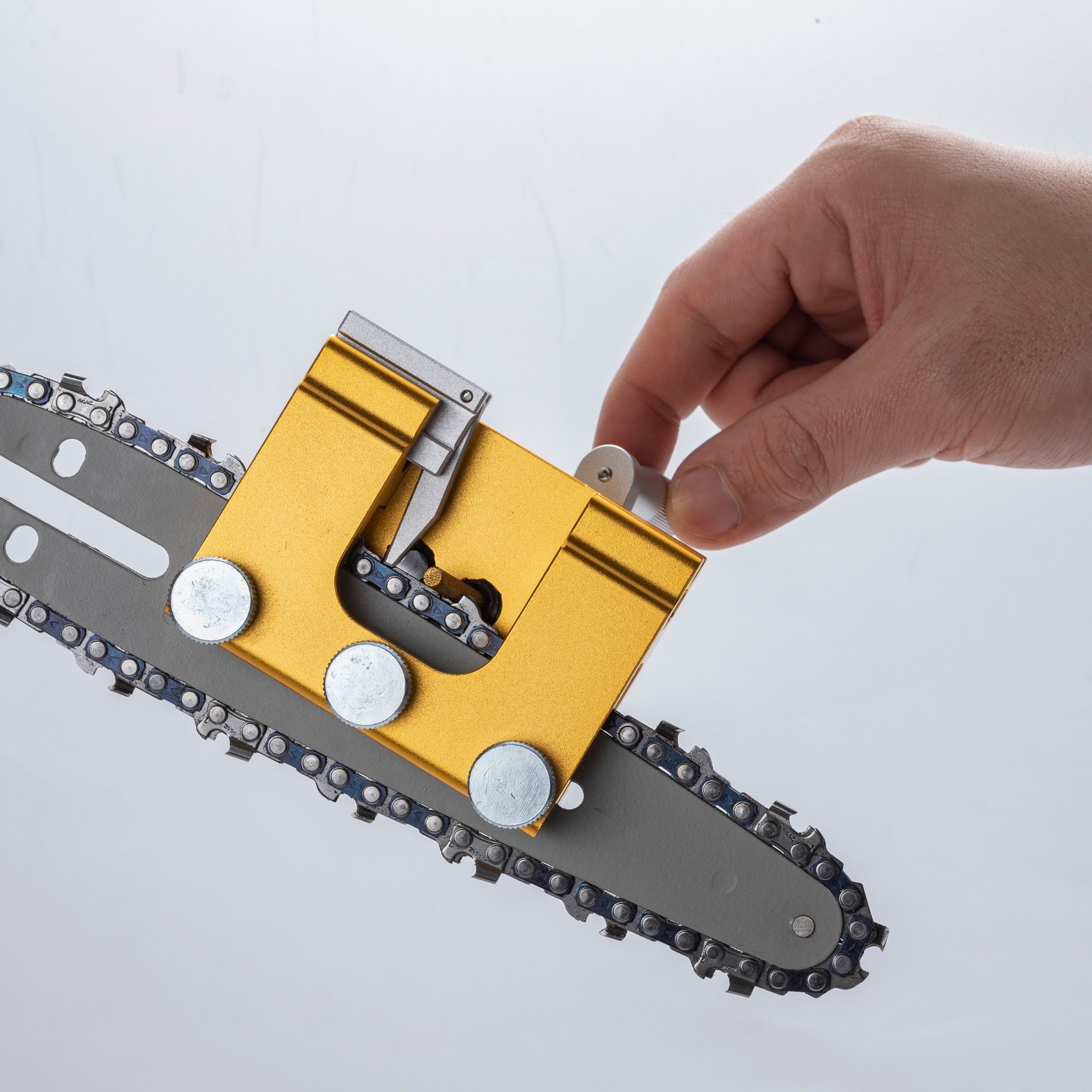 Draagbaar gereedschap voor kettingzaag-slijper