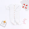 Gebreide baby romper